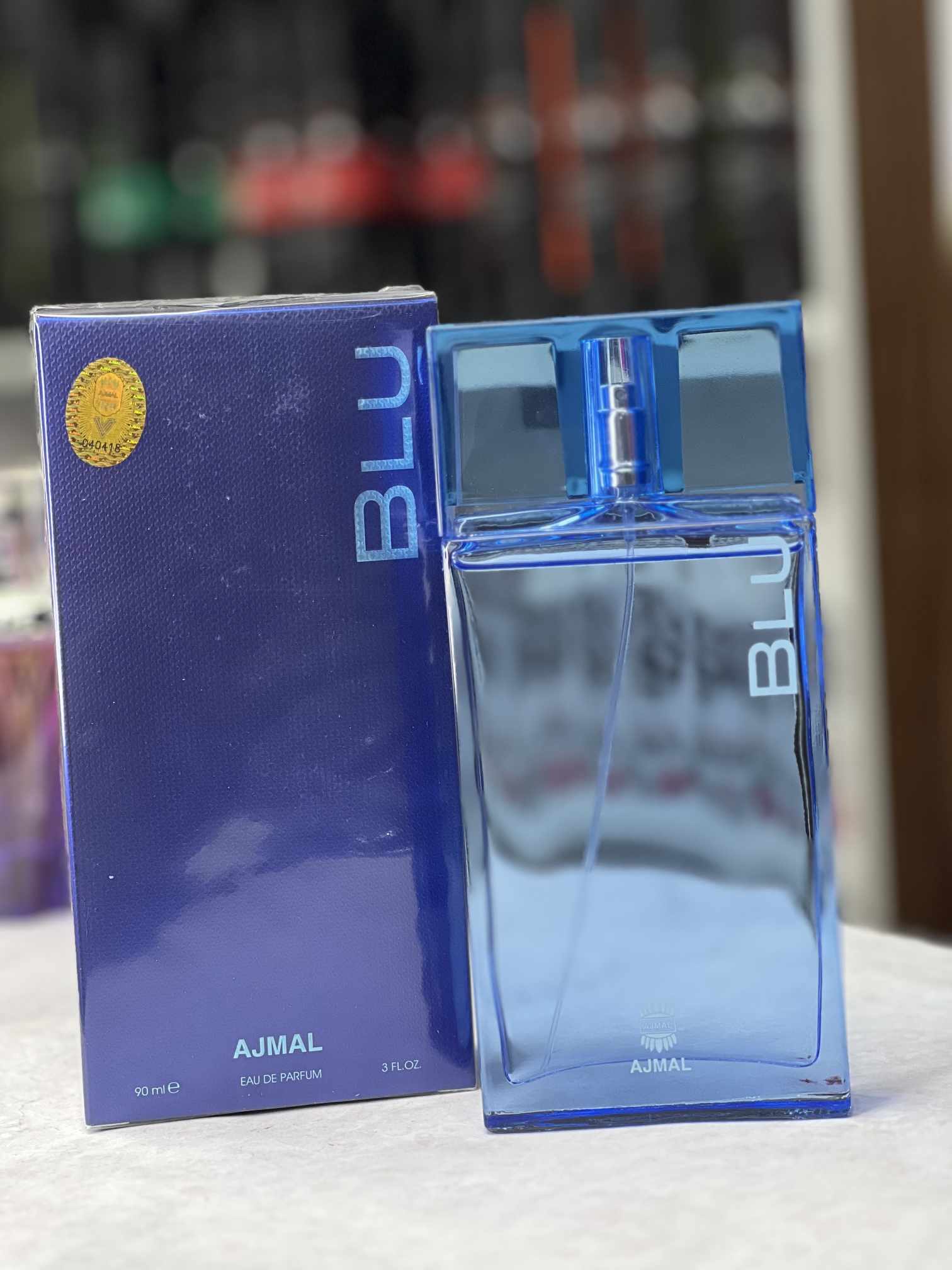 عطر ادوپرفیوم مردانه اجمل مدل بلو حجم ۹۰ میلی لیتر